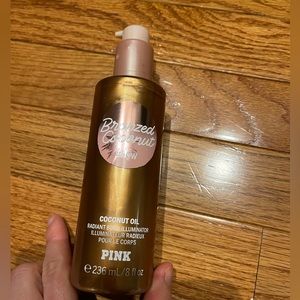 Pink bronzed coconut glow illuminator. Used once but mostly full